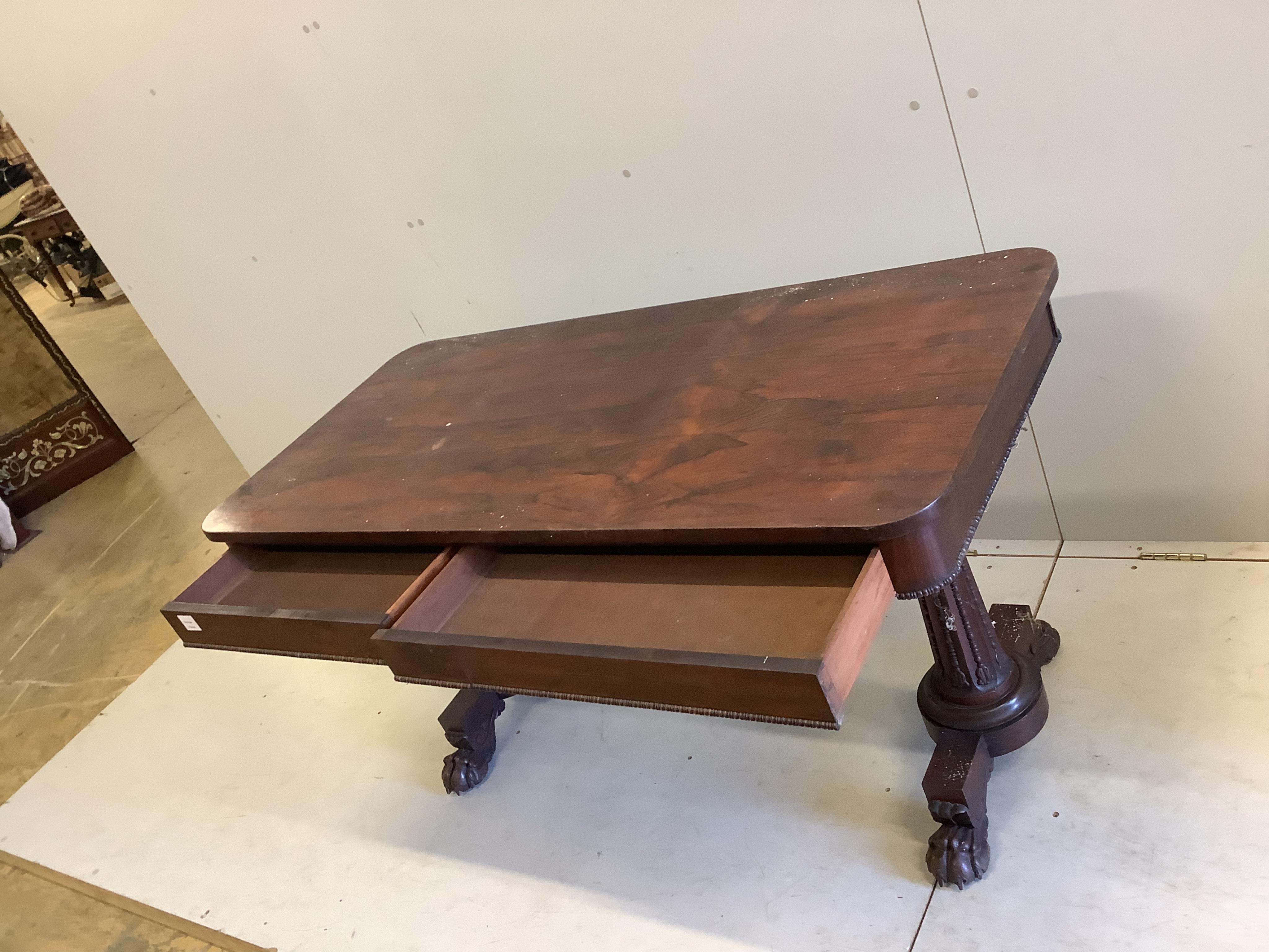 An early Victorian rosewood centre table, width 137cm, depth 64cm, height 72cm. Condition - fair